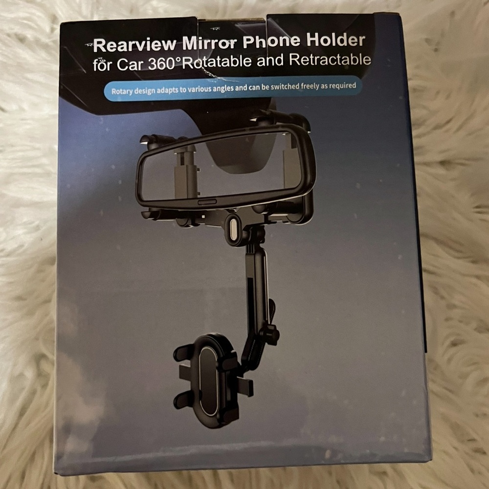 Rearview mirror phone holder